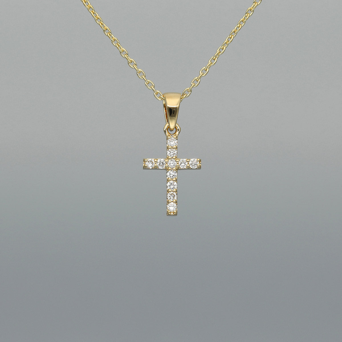 Collier "Kreuz S/O" aus 750 Gelbgold mit Brillanten