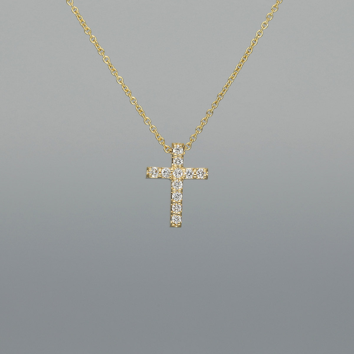 Collier "Kreuz S" aus 750 Gelbgold mit Brillanten