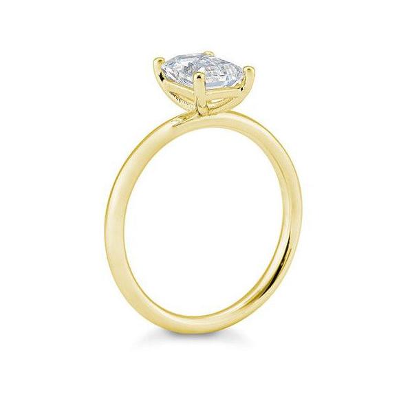 Verlobungsring mit einem Emerald - Cut Diamond 1,50 ct., Gelbgold
