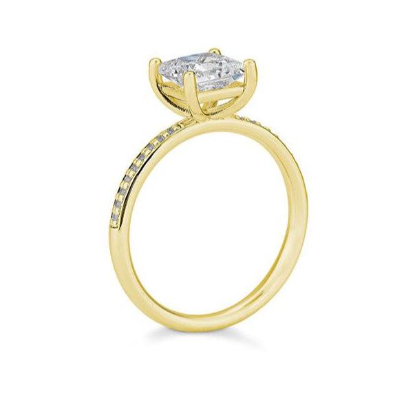 Verlobungsring mit einem Princess - Cut und 18 Brillanten 0,689 ct., Gelbgold