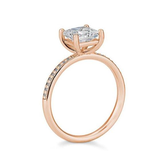 Verlobungsring 1,00ct. Princess - Cut und 18 Brillanten, Rotgold