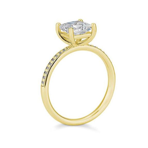 Verlobungsring 1,50ct. Princess - Cut und 18 Brillanten, Gelbgold