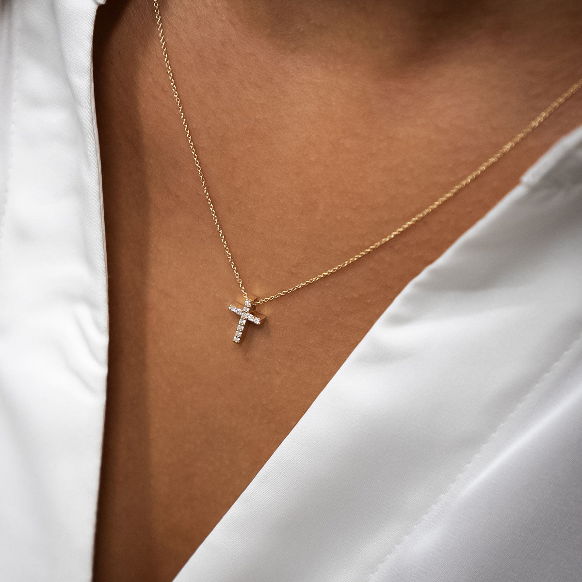 Collier "Kreuz S" aus 750 Gelbgold mit Brillanten