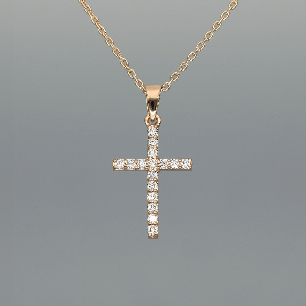 Collier "Kreuz M/O" aus 750 Rotgold mit Brillanten