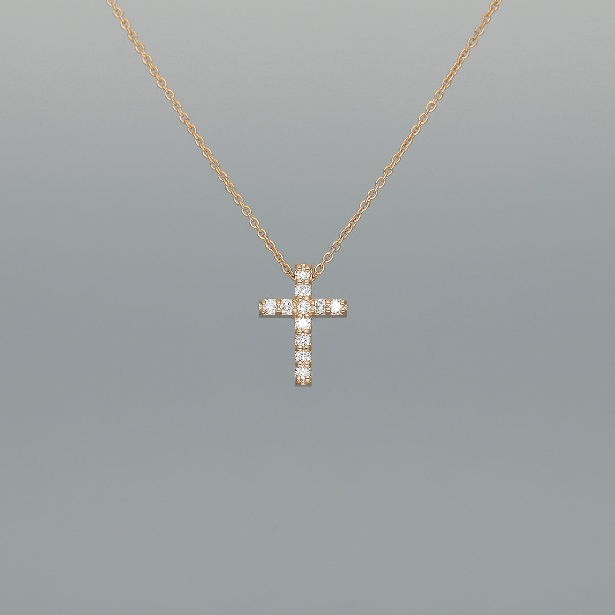 Collier "Kreuz S" aus 750 Rotgold mit Brillanten